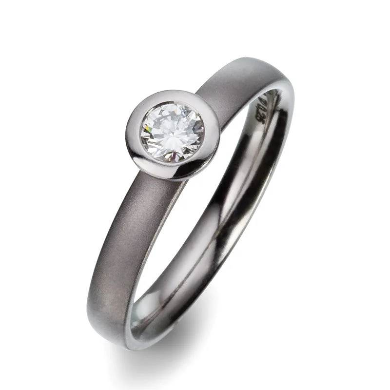 Titanium Rings with a Sound - Emitting Charm for a Unique Accessory51662-01 TeNo Titanium Ring Titanium Rings with a Sound - Emitting Charm for a Unique Accessory51662-01 TeNo Titanium Ring