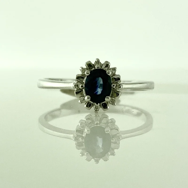 Rhinestone - Embellished Fashion Rings in Silver - Tone Metal for a Glamorous TouchSapphire Halo Ring Rhinestone - Embellished Fashion Rings in Silver - Tone Metal for a Glamorous TouchSapphire Halo Ring