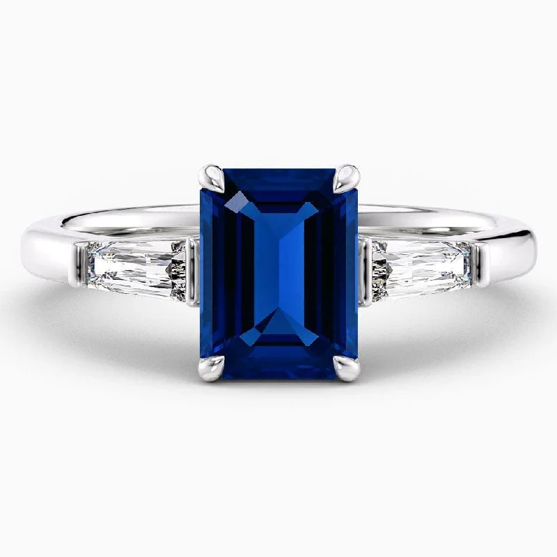 Men's Sapphire Engagement Rings in 18K White Gold with Pave Diamond Accents2 Carat Emerald Shape Three Stone Blue Sapphire Engagement Ring Men's Sapphire Engagement Rings in 18K White Gold with Pave Diamond Accents2 Carat Emerald Shape Three Stone Blue Sapphire Engagement Ring