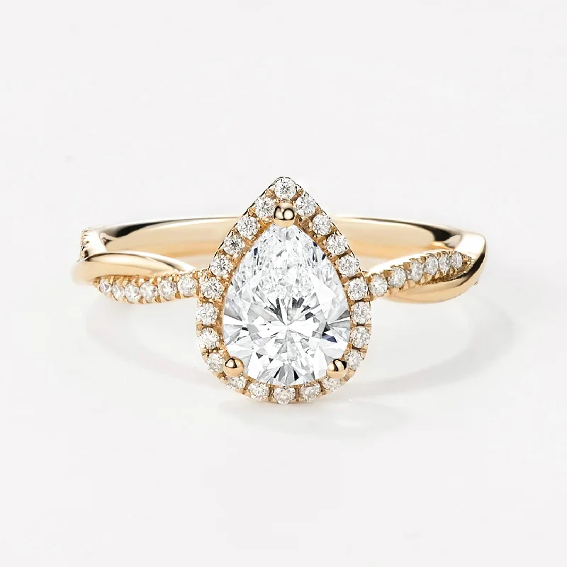 Halo - Style Women's Diamond Rings with a Center Diamond Surrounded by Smaller Diamonds in 18K Gold1.0ct Pear Shaped Lab Grown Diamond Infinity Halo Gold Ring Halo - Style Women's Diamond Rings with a Center Diamond Surrounded by Smaller Diamonds in 18K Gold1.0ct Pear Shaped Lab Grown Diamond Infinity Halo Gold Ring