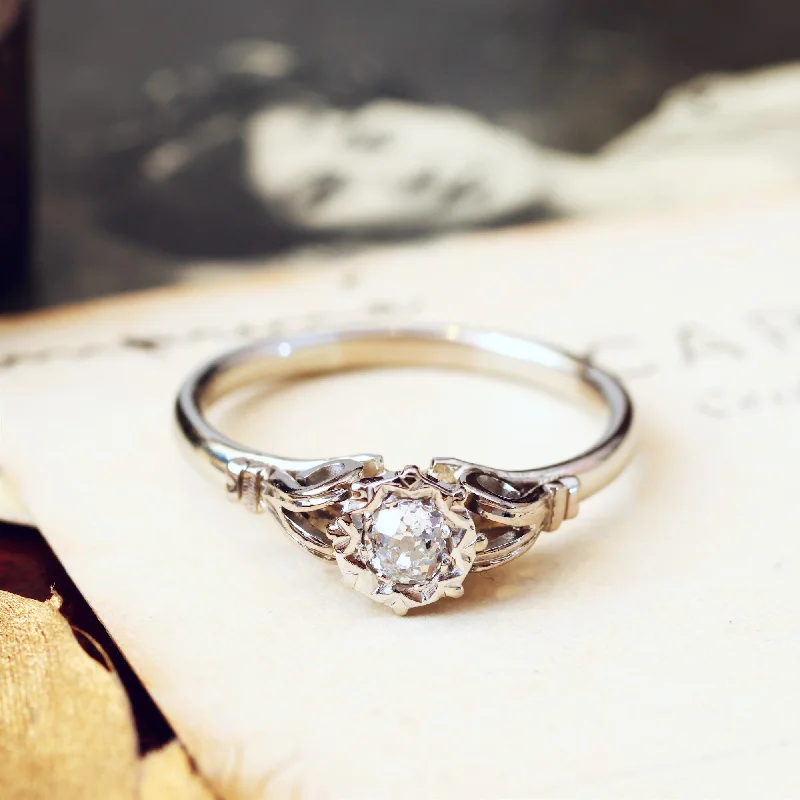 Engagement - Inspired Women's Rings with a Halo of Small DiamondsVintage 1950's White Gold Recycled Diamond Engagement Ring Engagement - Inspired Women's Rings with a Halo of Small DiamondsVintage 1950's White Gold Recycled Diamond Engagement Ring
