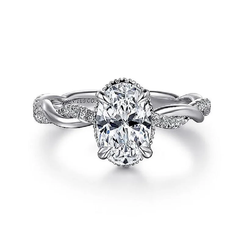 Art Deco - Inspired Women's Diamond Rings with Geometric Designs and Baguette - Cut Diamonds14K White Gold 'Ama' Halo Oval Diamond Engagement Ring Art Deco - Inspired Women's Diamond Rings with Geometric Designs and Baguette - Cut Diamonds14K White Gold 'Ama' Halo Oval Diamond Engagement Ring