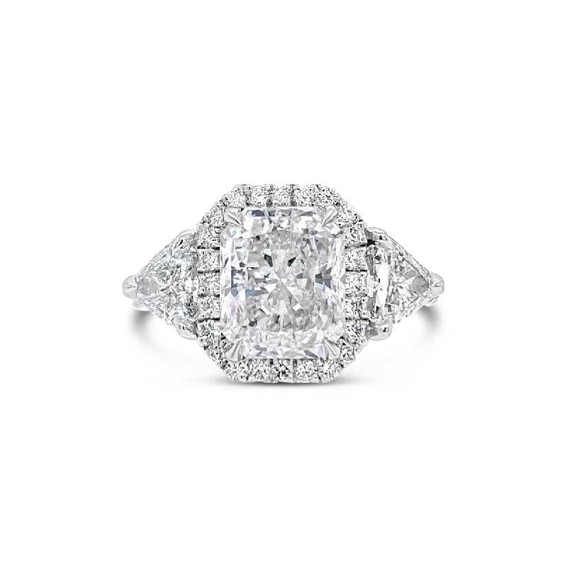 Men's Alexandrite Engagement Rings in Platinum with a Hidden Halo of DiamondsThree-Stone Elongated Radiant-Cut Diamond Engagement Ring Men's Alexandrite Engagement Rings in Platinum with a Hidden Halo of DiamondsThree-Stone Elongated Radiant-Cut Diamond Engagement Ring