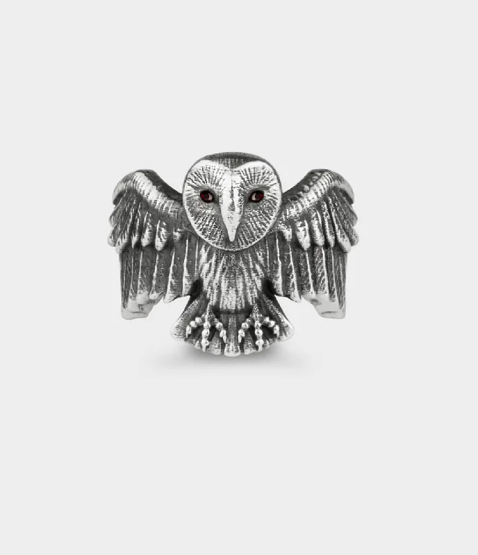 Anniversary rings with a diamond - and - peridot combinationOwl Ring