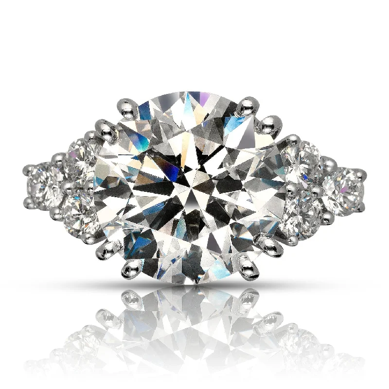 Halo - Style Women's Diamond Rings with a Center Diamond Surrounded by Smaller Diamonds in 18K GoldJAYA 8 CARAT ROUND CUT E COLOR VS1 CLARITY DIAMOND ENGAGEMENT RING 18K WHITE GOLD GIA CERTIFIED 6 CT E VS1 BY MIKE NEKTA Halo - Style Women's Diamond Rings with a Center Diamond Surrounded by Smaller Diamonds in 18K GoldJAYA 8 CARAT ROUND CUT E COLOR VS1 CLARITY DIAMOND ENGAGEMENT RING 18K WHITE GOLD GIA CERTIFIED 6 CT E VS1 BY MIKE NEKTA