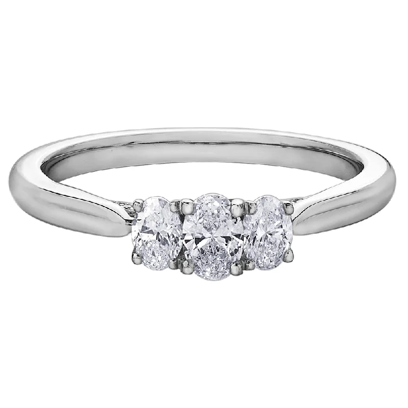 Anniversary rings with a prong - set diamond for maximum sparkleOval Three-Stone Diamond Ring Anniversary rings with a prong - set diamond for maximum sparkleOval Three-Stone Diamond Ring