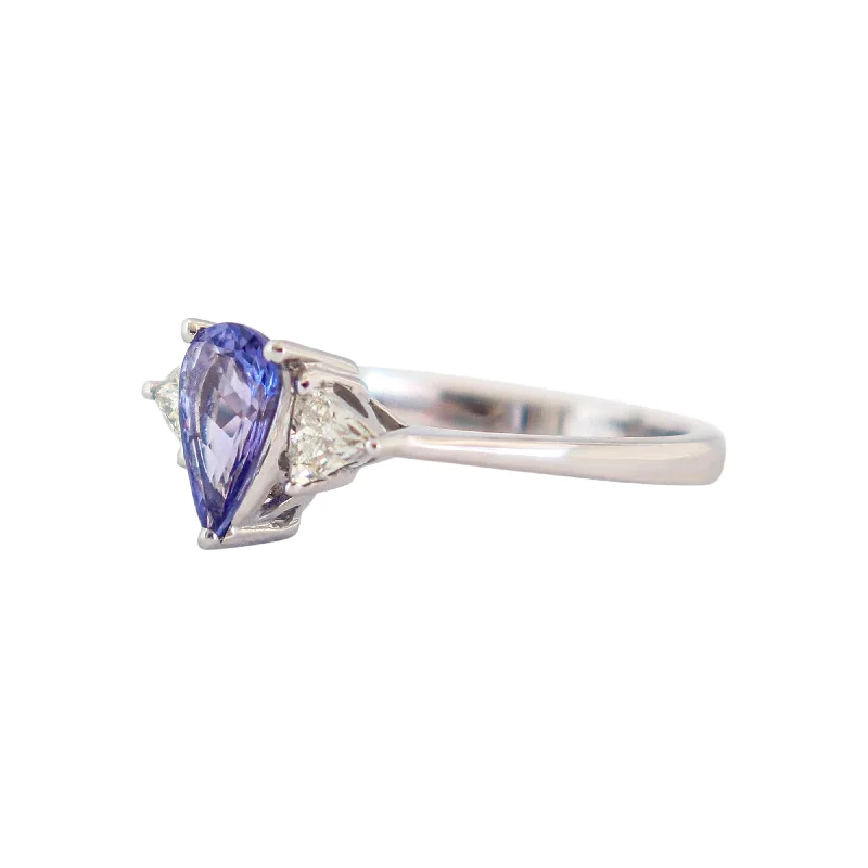 Statement - Making Cocktail Rings for Women with Large Cubic ZirconiaWhite Gold Pear Tanzanite and Trillion Diamond Trilogy Ring Statement - Making Cocktail Rings for Women with Large Cubic ZirconiaWhite Gold Pear Tanzanite and Trillion Diamond Trilogy Ring