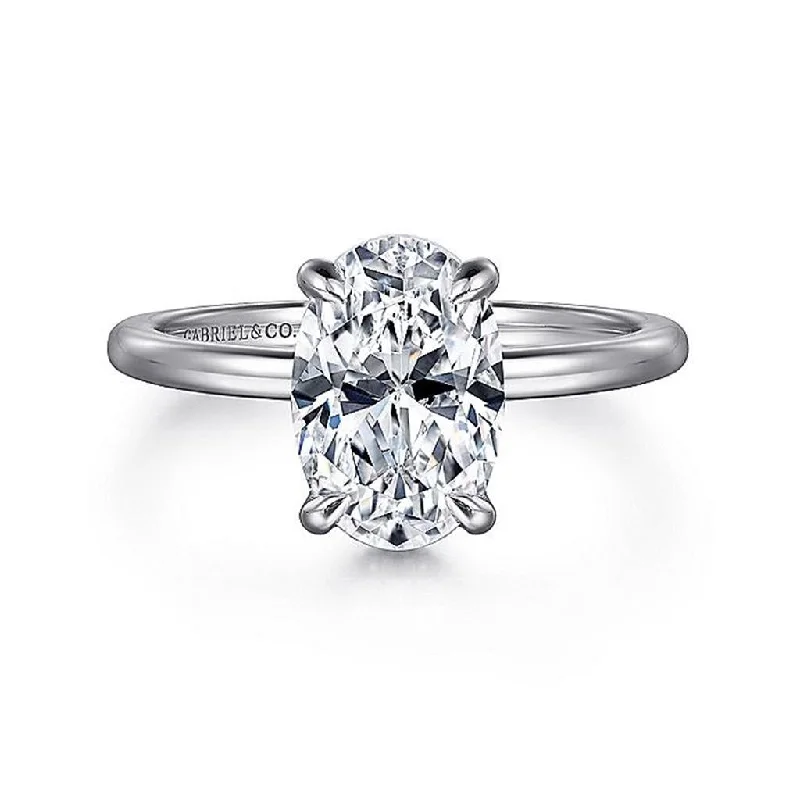 Cushion - Cut Women's Diamond Rings in Platinum with a Soft and Romantic Appearance14K White Gold 'Rainah' Hidden Halo Oval Diamond Engagement Ring