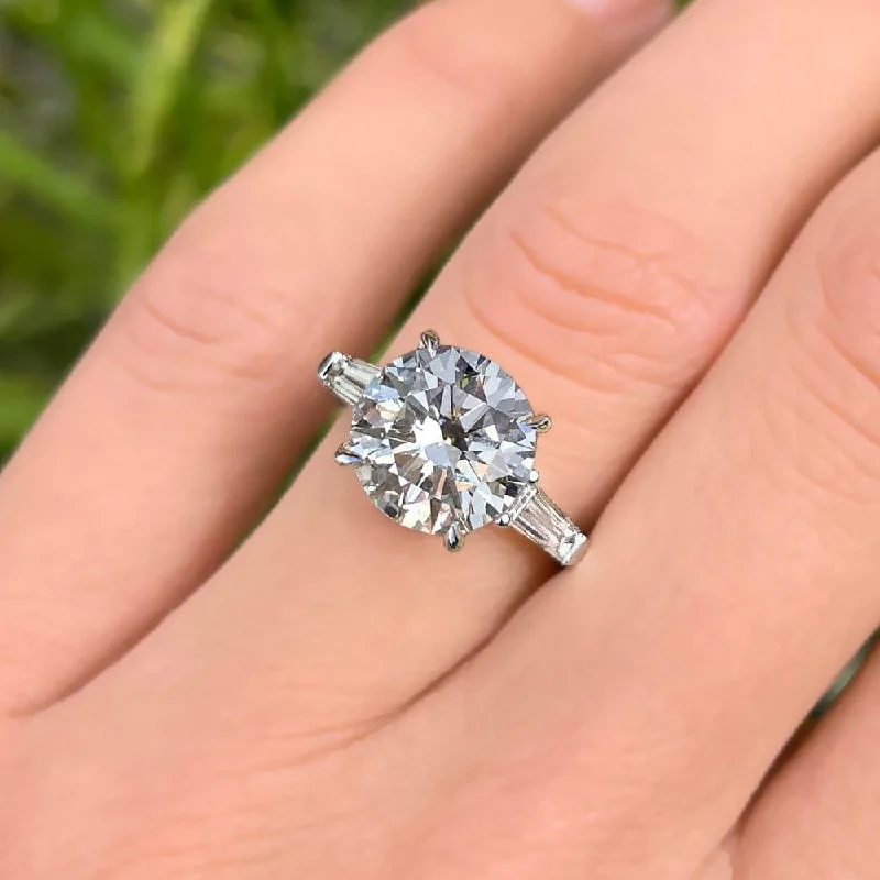 Men's Tanzanite Engagement Rings in Palladium with a Three - Stone Arrangement4.20 Carat Round Shape Three Stone Moissanite Engagement Ring Men's Tanzanite Engagement Rings in Palladium with a Three - Stone Arrangement4.20 Carat Round Shape Three Stone Moissanite Engagement Ring
