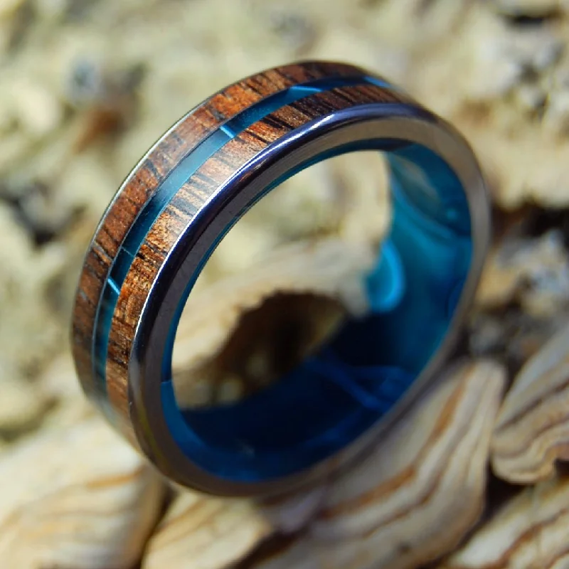 Men's black ceramic rings for a modern and edgy lookOutrigger | Men's Hawaiian Koa Wood & Titanium Wedding Ring Men's black ceramic rings for a modern and edgy lookOutrigger | Men's Hawaiian Koa Wood & Titanium Wedding Ring