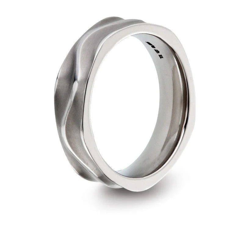 Titanium Rings with a Star - Shaped Gemstone Setting for a Celestial Theme52398-01 TeNo Titanium Ring Titanium Rings with a Star - Shaped Gemstone Setting for a Celestial Theme52398-01 TeNo Titanium Ring