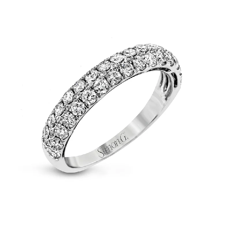 Anniversary rings with a hidden diamond in the bandSimon G Diamond Anniversary Band