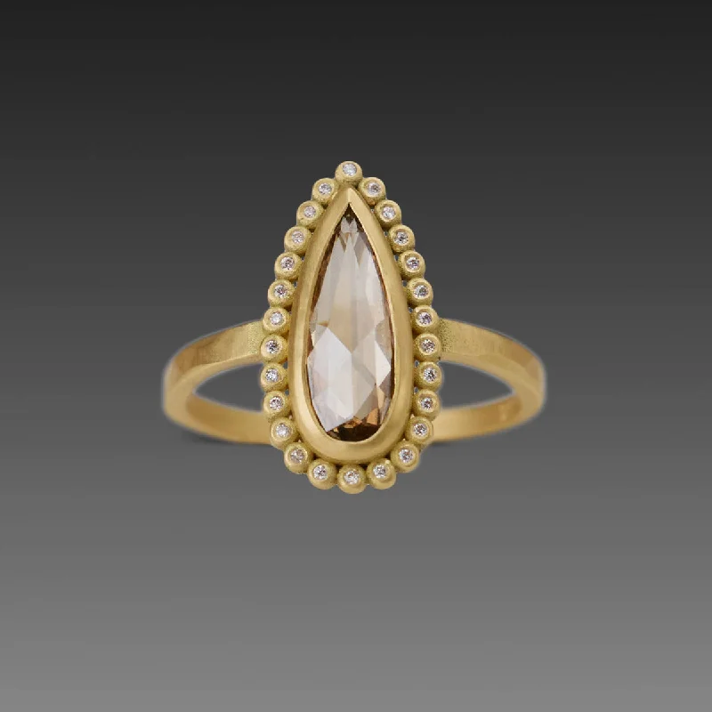 Peridot Gemstone Rings in 14K Gold - Filled Metal with a Pave - Set Band for a Sparkling LookChampagne Diamond Ring with Diamond Halo Peridot Gemstone Rings in 14K Gold - Filled Metal with a Pave - Set Band for a Sparkling LookChampagne Diamond Ring with Diamond Halo
