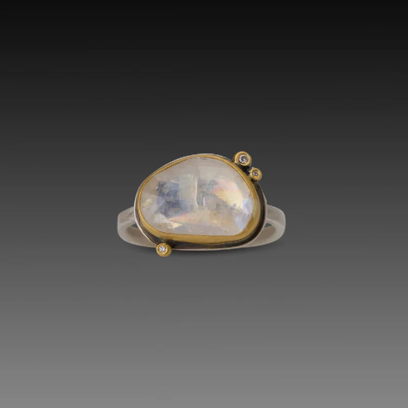 Peridot Gemstone Rings in 14K Gold - Filled Metal with a Pave - Set Band for a Sparkling LookGlowing Rainbow Moonstone Ring with Diamonds Peridot Gemstone Rings in 14K Gold - Filled Metal with a Pave - Set Band for a Sparkling LookGlowing Rainbow Moonstone Ring with Diamonds
