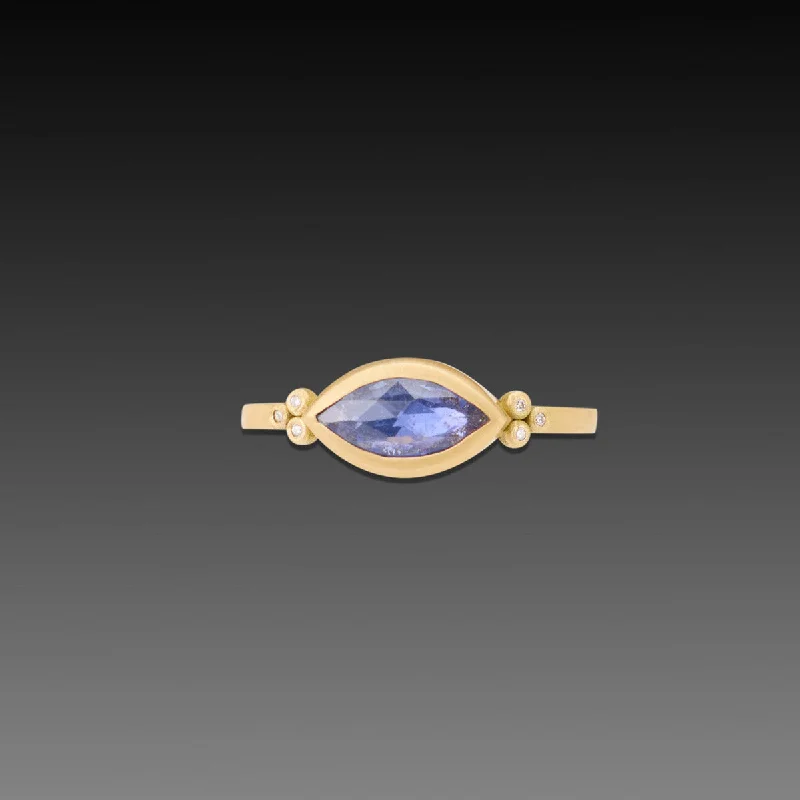 Malachite Gemstone Rings in 14K Gold with a Carved Stone for a Unique and Artistic AppealMarquise Blue Sapphire Ring with Diamond Trios Malachite Gemstone Rings in 14K Gold with a Carved Stone for a Unique and Artistic AppealMarquise Blue Sapphire Ring with Diamond Trios