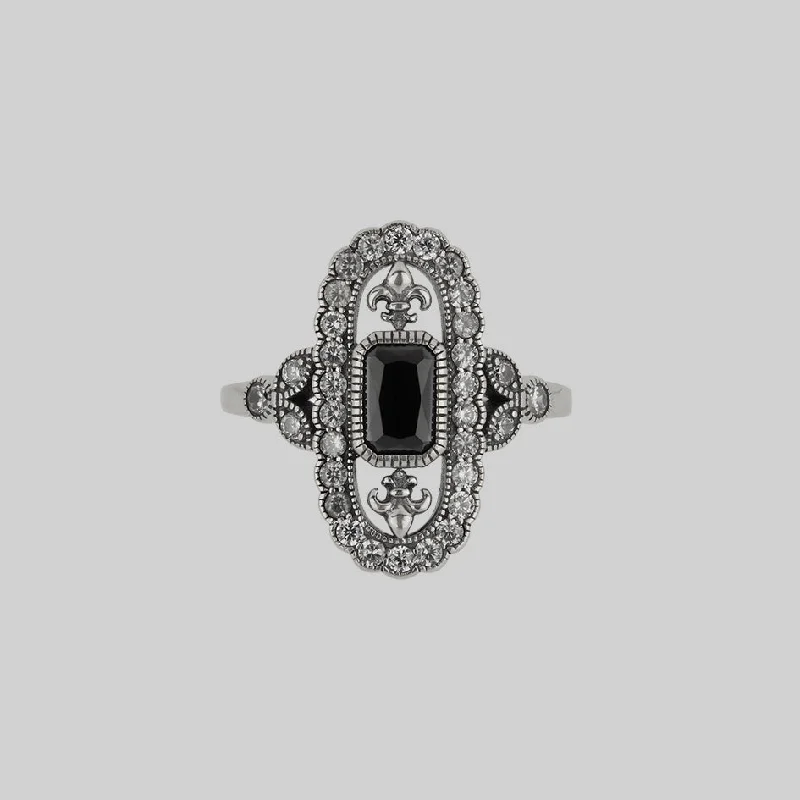 Tanzanite Gemstone Rings in 10K Gold with a Trilogy Design for a Sophisticated GiftVANYA. Vampesque Black Onyx Ring - Silver Tanzanite Gemstone Rings in 10K Gold with a Trilogy Design for a Sophisticated GiftVANYA. Vampesque Black Onyx Ring - Silver