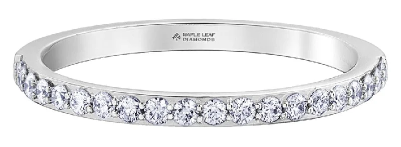 Rings to commemorate a volunteer experience with a related symbolWhite Gold Canadian Diamond Band. Rings to commemorate a volunteer experience with a related symbolWhite Gold Canadian Diamond Band.