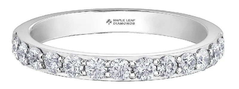 Commemorate rings with a filigree - wrapped gemstoneWhite Gold Canadian Diamond Band.