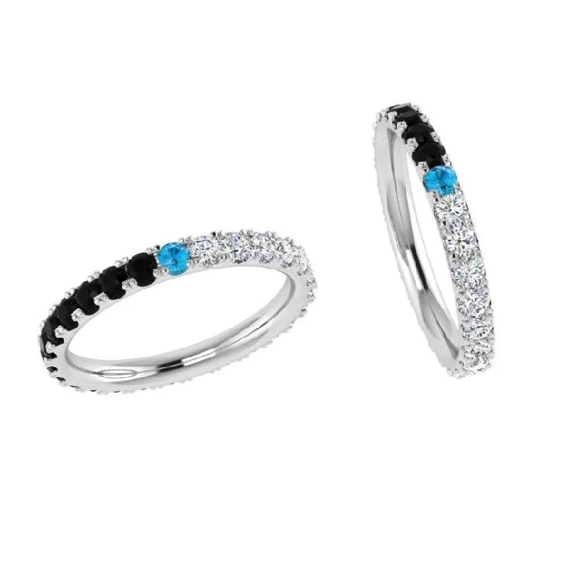 Ruby - centered commemorate rings to symbolize passionBlack and White Diamond Eternity Band Ruby - centered commemorate rings to symbolize passionBlack and White Diamond Eternity Band