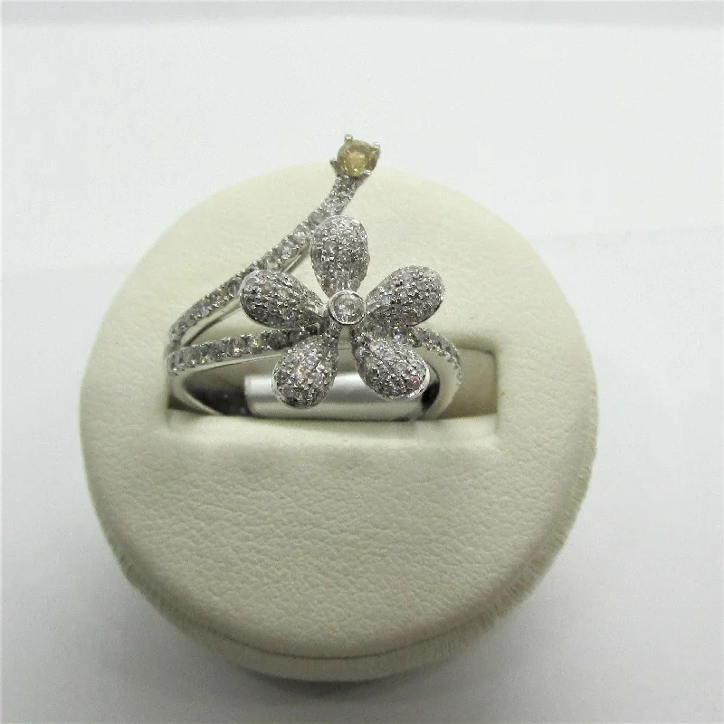 Cubic zirconia - filled commemorate rings for an affordable optionDiamond Flower Ring in White Gold Cubic zirconia - filled commemorate rings for an affordable optionDiamond Flower Ring in White Gold